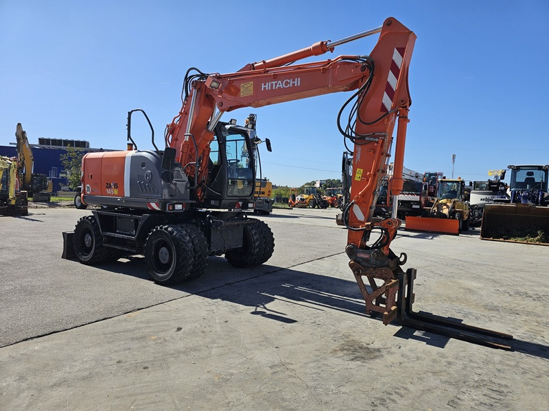 HITACHI ZX145W-3 - Колёсный экскаватор: фото 5 HITACHI ZX145W-3 - Колёсный экскаватор: фото 5