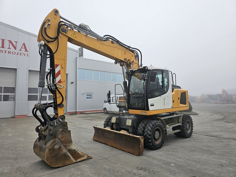 Колёсный экскаватор LIEBHERR A916: фото 6