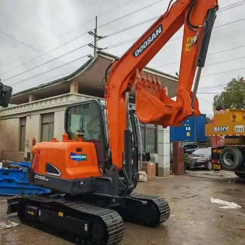 Doosan DX55-9C - Мини-экскаватор: фото 1 Doosan DX55-9C - Мини-экскаватор: фото 1