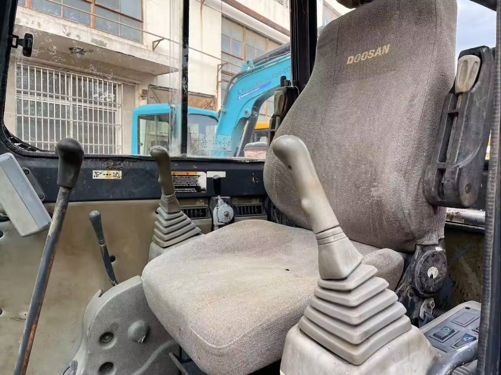 Doosan DX55-9C - Мини-экскаватор: фото 5 Doosan DX55-9C - Мини-экскаватор: фото 5