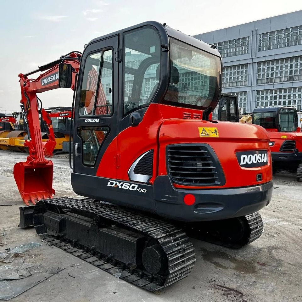 Doosan DX60-9C - Мини-экскаватор: фото 1 Doosan DX60-9C - Мини-экскаватор: фото 1