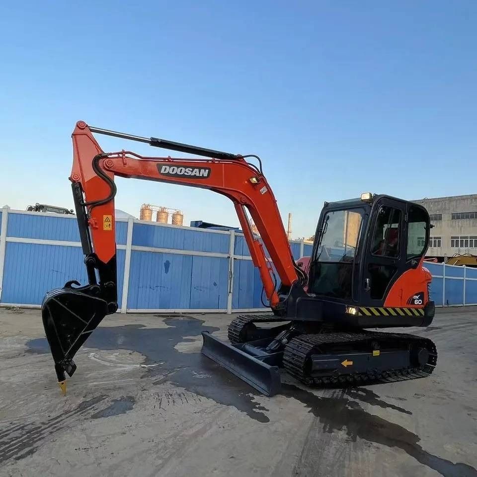 Doosan DX60-9C - Мини-экскаватор: фото 1 Doosan DX60-9C - Мини-экскаватор: фото 1