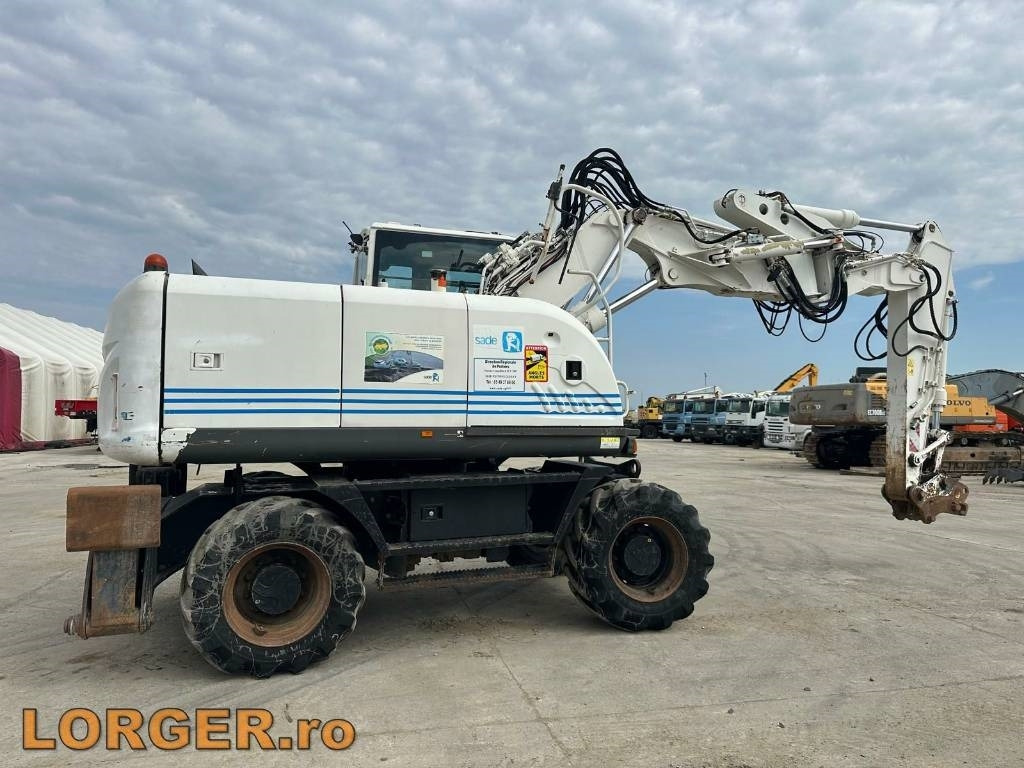 Hitachi ZX 140 W-3 - Колёсный экскаватор: фото 2 Hitachi ZX 140 W-3 - Колёсный экскаватор: фото 2