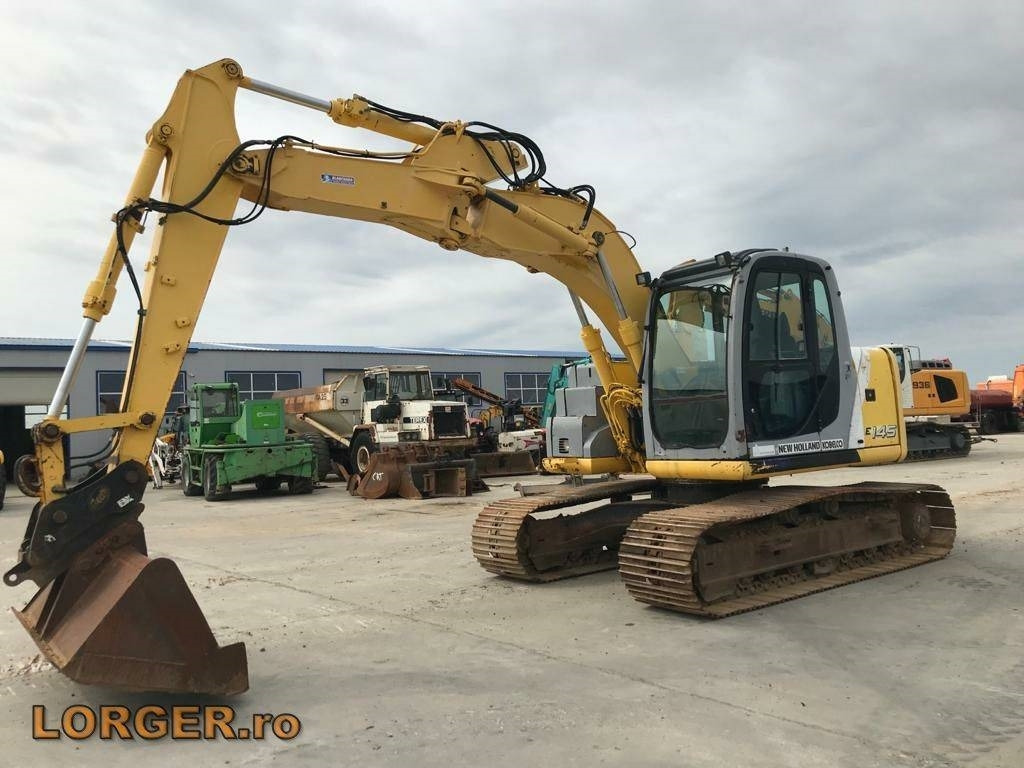 New Holland E 145 - Гусеничный экскаватор: фото 1 New Holland E 145 - Гусеничный экскаватор: фото 1