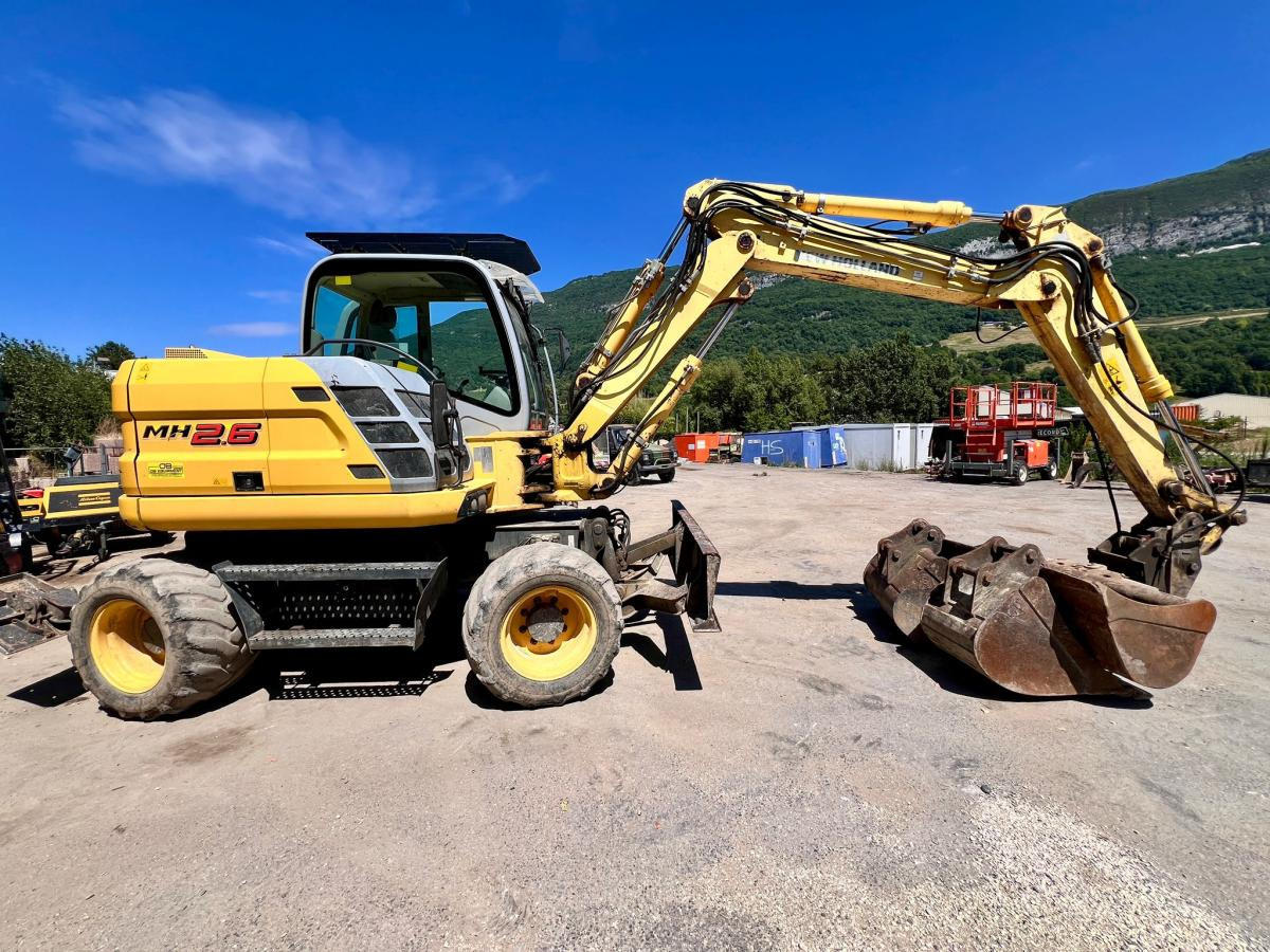New Holland MH 2.6 PELLE A PNEUS 10T - Колёсный экскаватор: фото 5 New Holland MH 2.6 PELLE A PNEUS 10T - Колёсный экскаватор: фото 5