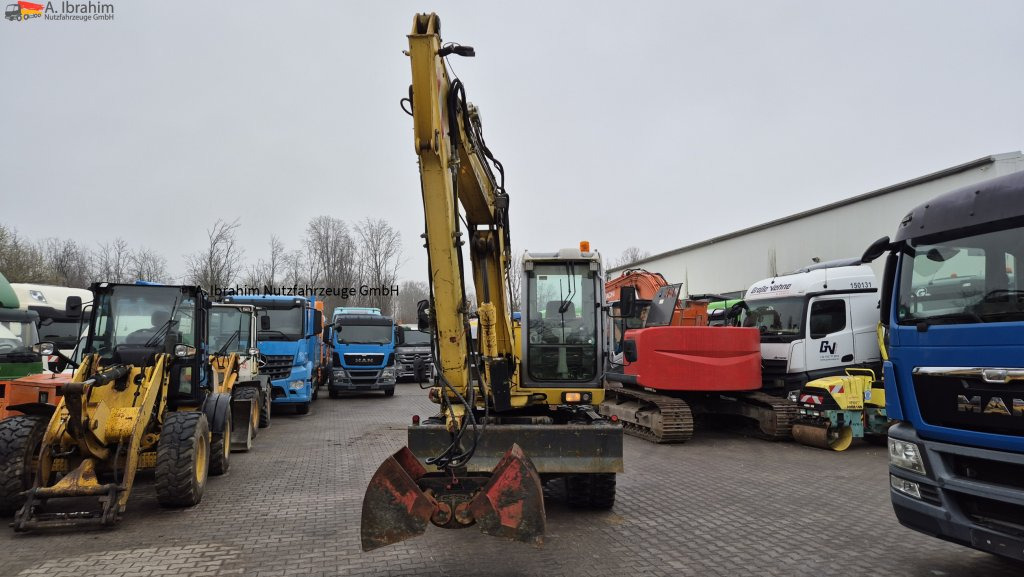 Колёсный экскаватор New Holland MH 2.6 Zustand gut, deutsche Maschine incl. Greifer und Dreservo: фото 8