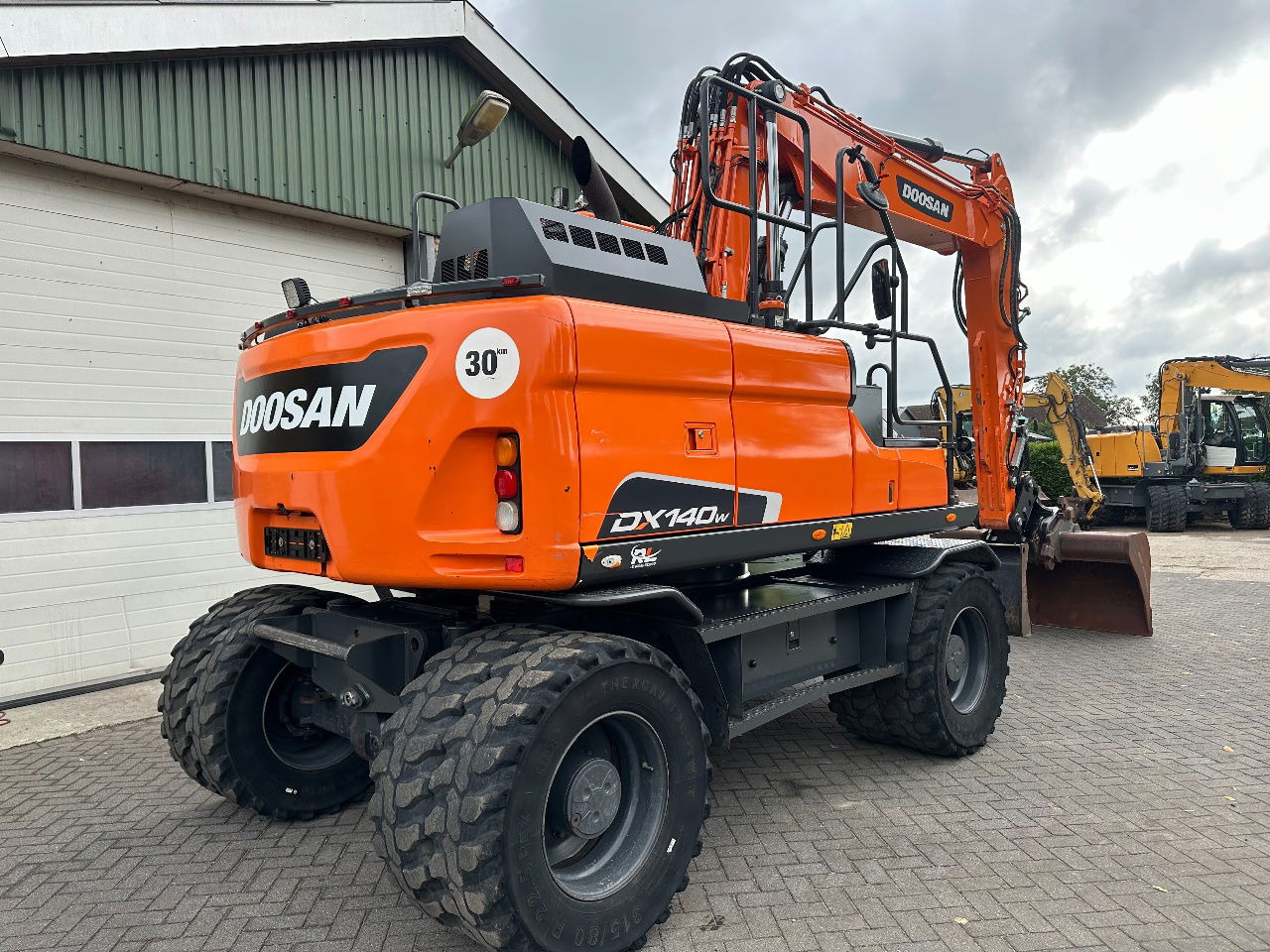 Doosan DX140W-5 - Колёсный экскаватор: фото 4 Doosan DX140W-5 - Колёсный экскаватор: фото 4
