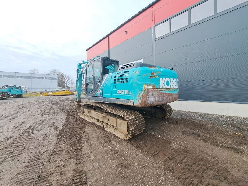 Kobelco SK 210-10 - Гусеничный экскаватор: фото 3 Kobelco SK 210-10 - Гусеничный экскаватор: фото 3