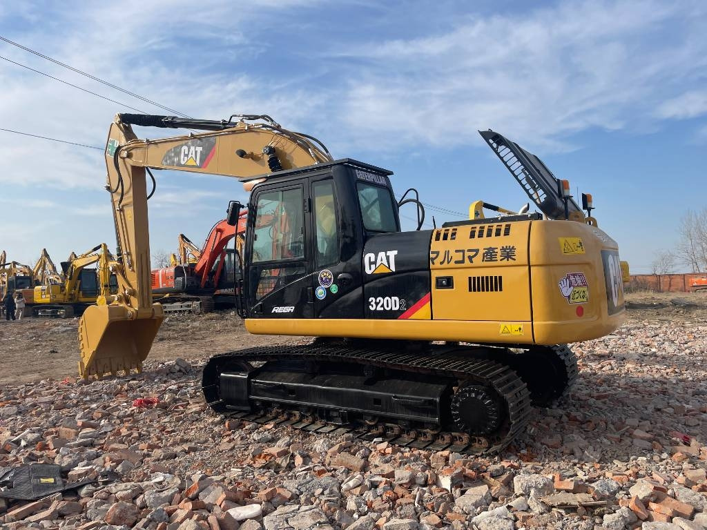 CAT 320D2 - Гусеничный экскаватор: фото 1 CAT 320D2 - Гусеничный экскаватор: фото 1