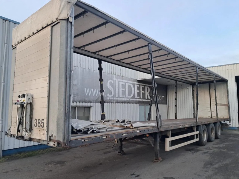 Fliegl 3x Ror Axle , Flat Trailer - Тентованный полуприцеп: фото 1 Fliegl 3x Ror Axle , Flat Trailer - Тентованный полуприцеп: фото 1