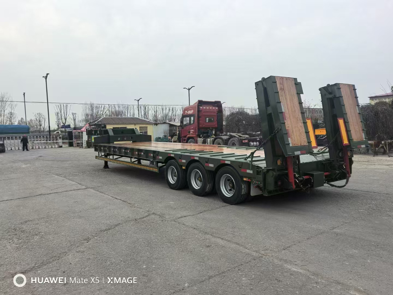 ZHICHENG Semi Flat Bed Low Bed in Length 8-16m with 3 4 Axles - Низкорамный полуприцеп: фото 1 ZHICHENG Semi Flat Bed Low Bed in Length 8-16m with 3 4 Axles - Низкорамный полуприцеп: фото 1