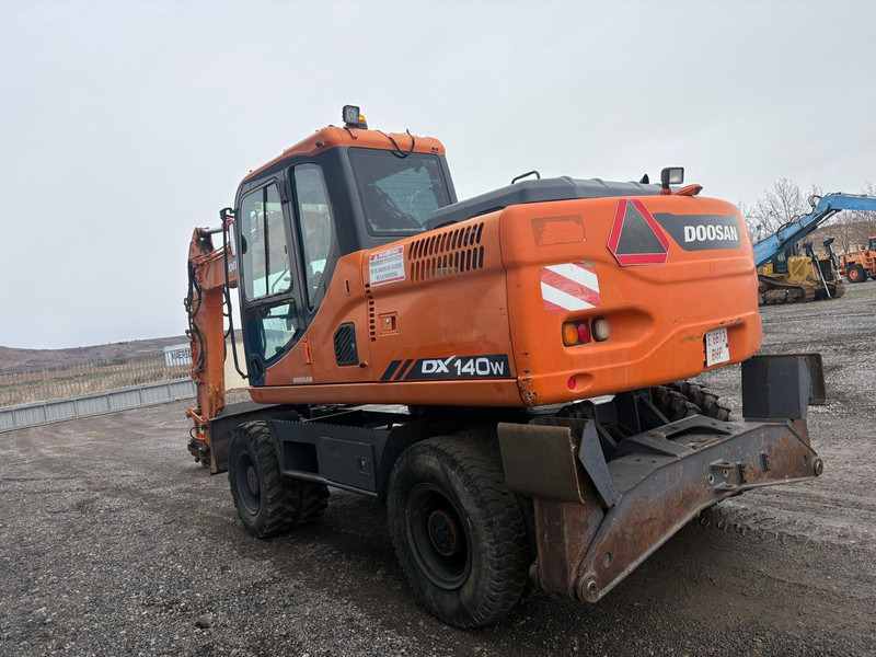 Doosan DX140W - Колёсный экскаватор: фото 2 Doosan DX140W - Колёсный экскаватор: фото 2