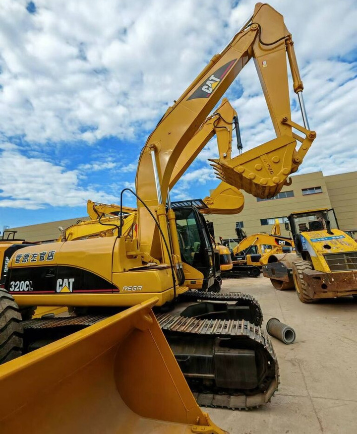 Caterpillar 320CL - Колёсный экскаватор: фото 2 Caterpillar 320CL - Колёсный экскаватор: фото 2