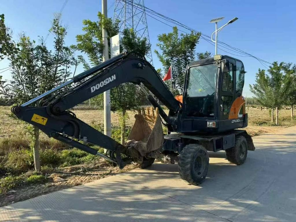 Doosan DX 60  - Мини-экскаватор: фото 1 Doosan DX 60  - Мини-экскаватор: фото 1