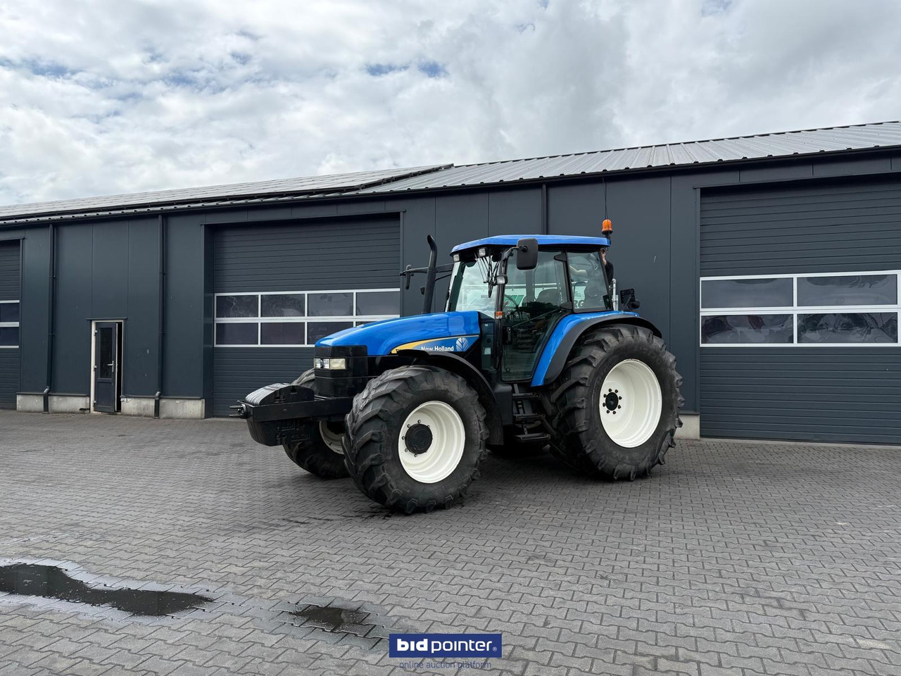 New Holland TM 140 - Трактор: фото 1 New Holland TM 140 - Трактор: фото 1