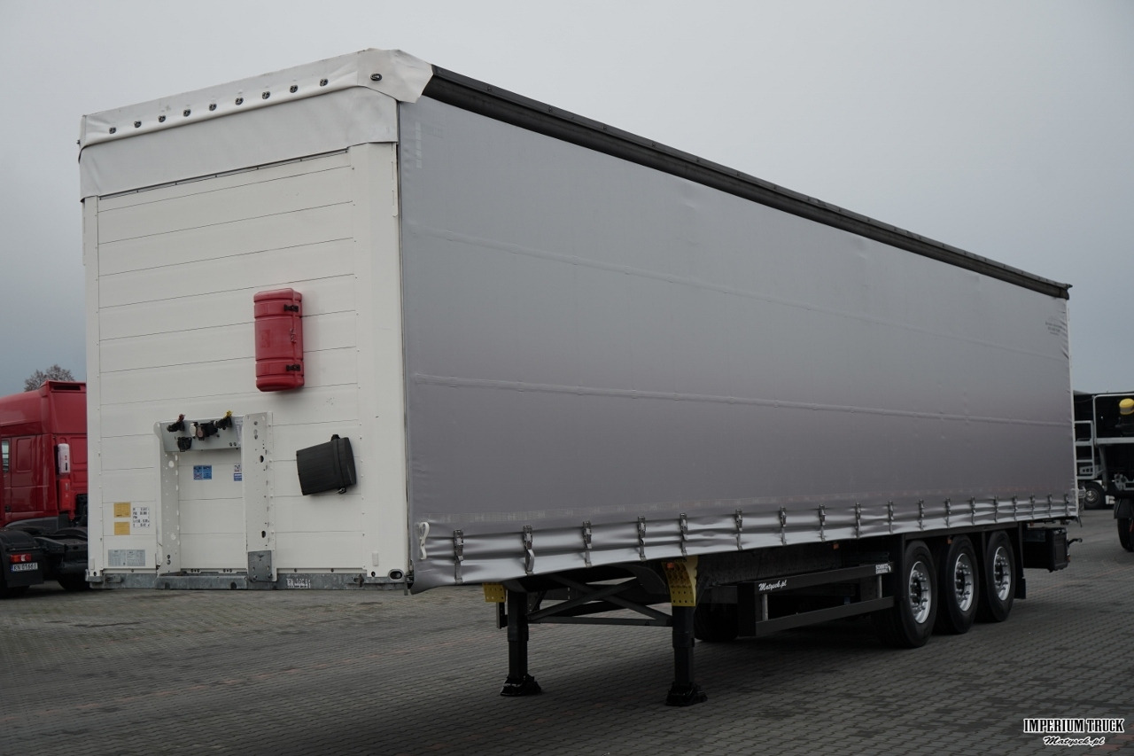 SCHMITZ-CARGOBULL / FIRANKA / STANDARD / 2 OSIE PODNOSZONE - Тентованный полуприцеп: фото 3 SCHMITZ-CARGOBULL / FIRANKA / STANDARD / 2 OSIE PODNOSZONE - Тентованный полуприцеп: фото 3