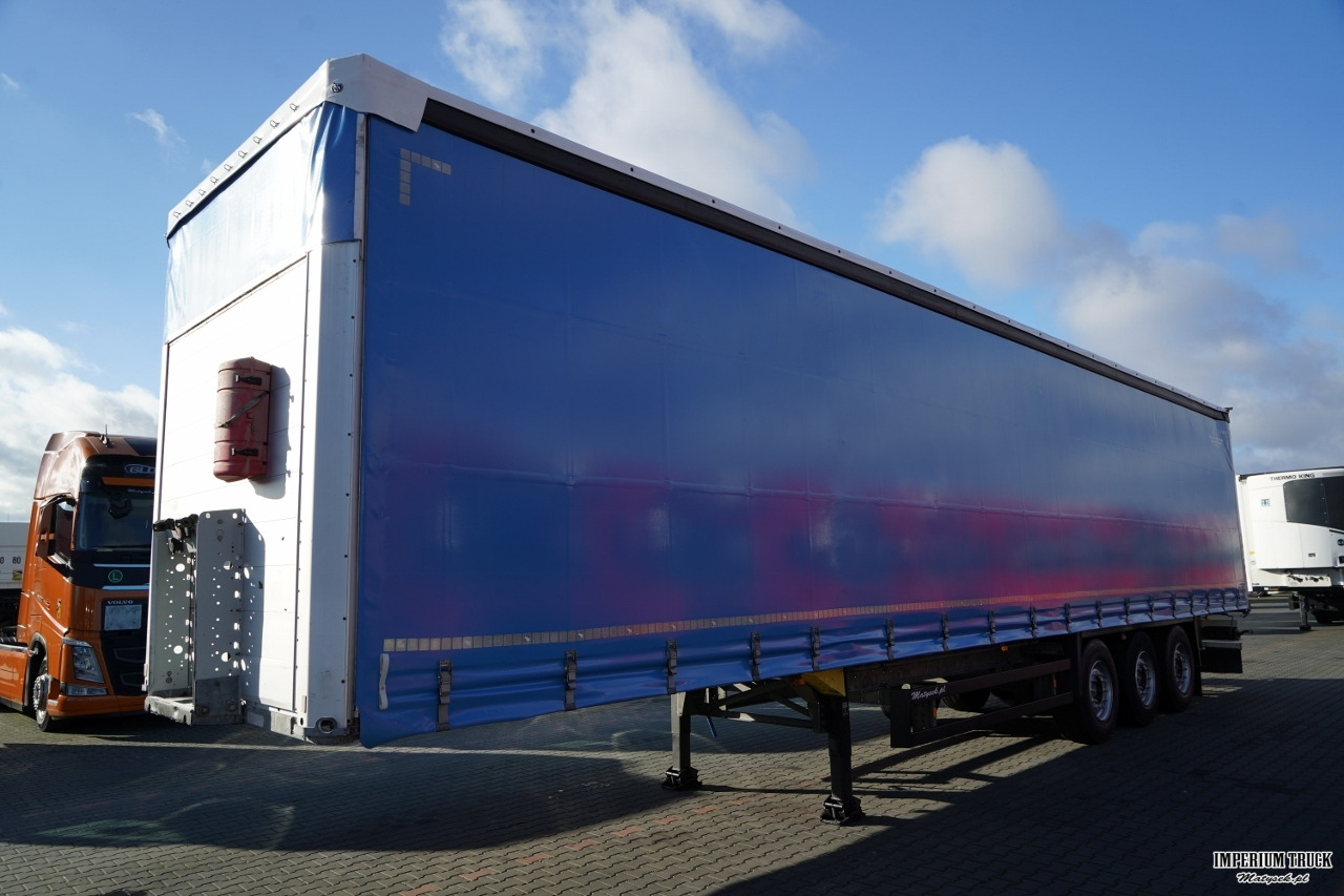 SCHMITZ-CARGOBULL / FIRANKA / STANDARD / 2 OSIE PODNOSZONE - Тентованный полуприцеп: фото 4 SCHMITZ-CARGOBULL / FIRANKA / STANDARD / 2 OSIE PODNOSZONE - Тентованный полуприцеп: фото 4