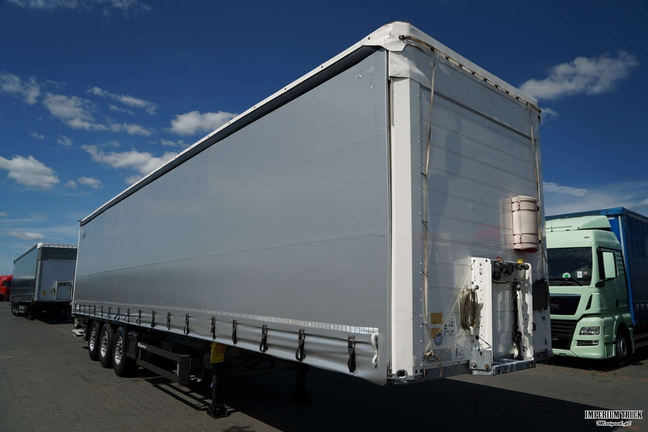 SCHMITZ-CARGOBULL / FIRANKA / STANDARD / DWIE OSIE PODNOSZONE / WINDA ZAŁADOWCZA DHOLLANDIA - 2000KG / 2016 - Тентованный полуприцеп: фото 2 SCHMITZ-CARGOBULL / FIRANKA / STANDARD / DWIE OSIE PODNOSZONE / WINDA ZAŁADOWCZA DHOLLANDIA - 2000KG / 2016 - Тентованный полуприцеп: фото 2