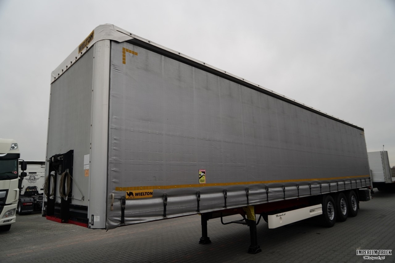 WIELTON / FIRANKA STANDARD / MULDA DO STALI - 9 M / OŚ PODNOSZONA / SAF / MAŁO UŻYWANA - Тентованный полуприцеп: фото 2 WIELTON / FIRANKA STANDARD / MULDA DO STALI - 9 M / OŚ PODNOSZONA / SAF / MAŁO UŻYWANA - Тентованный полуприцеп: фото 2