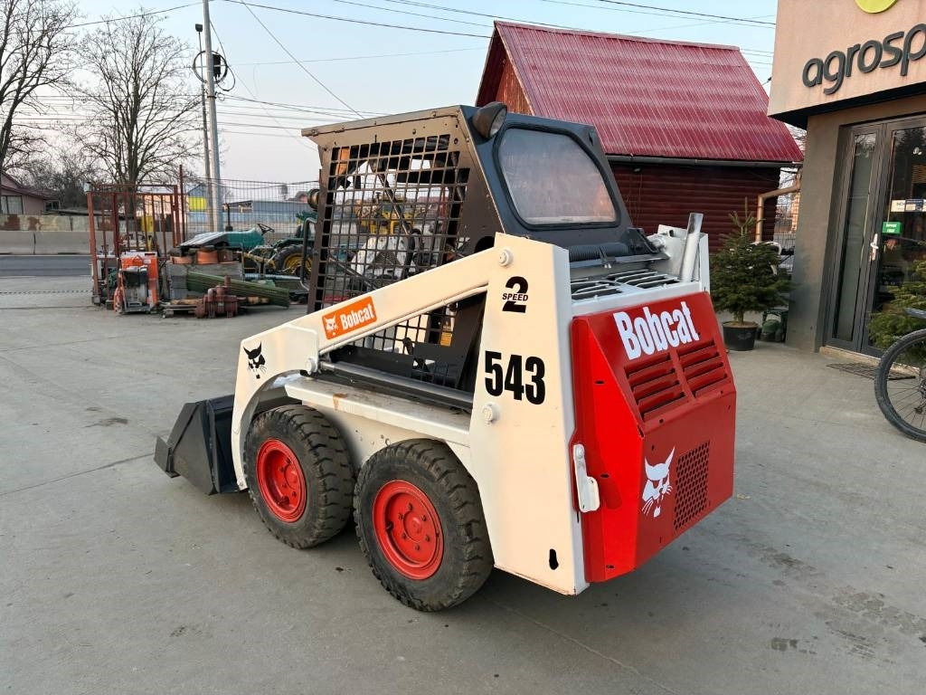 Bobcat 543 - Мини-погрузчик с бортовым поворотом: фото 4 Bobcat 543 - Мини-погрузчик с бортовым поворотом: фото 4