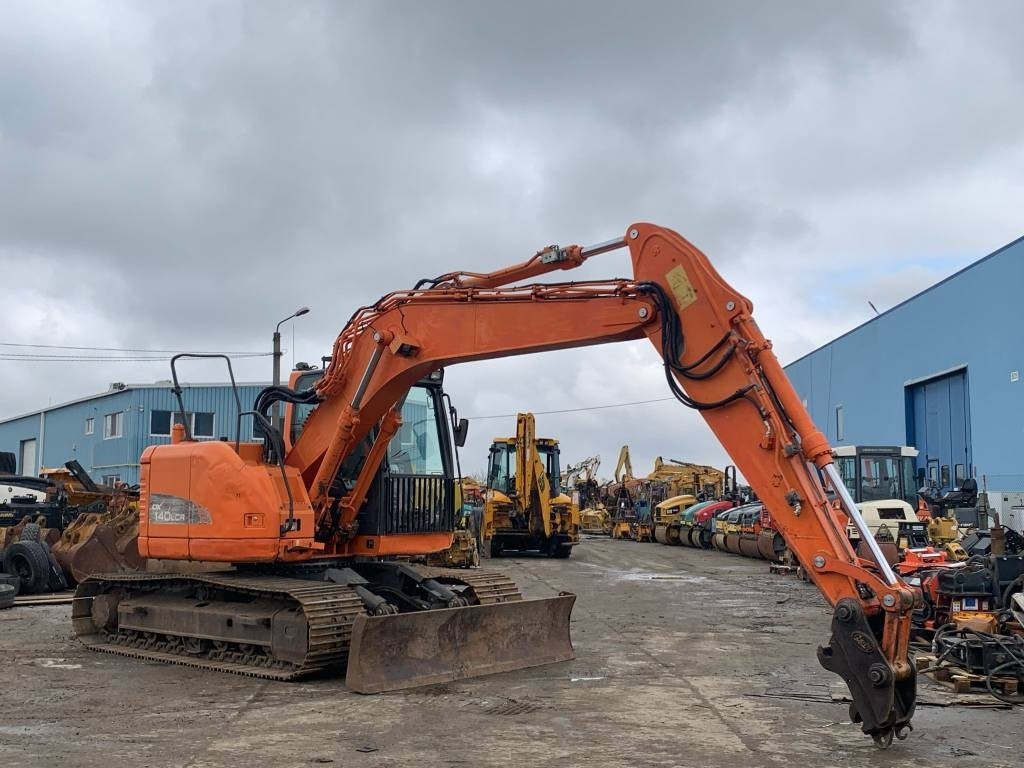Doosan DX 140 LCR - Гусеничный экскаватор: фото 2 Doosan DX 140 LCR - Гусеничный экскаватор: фото 2