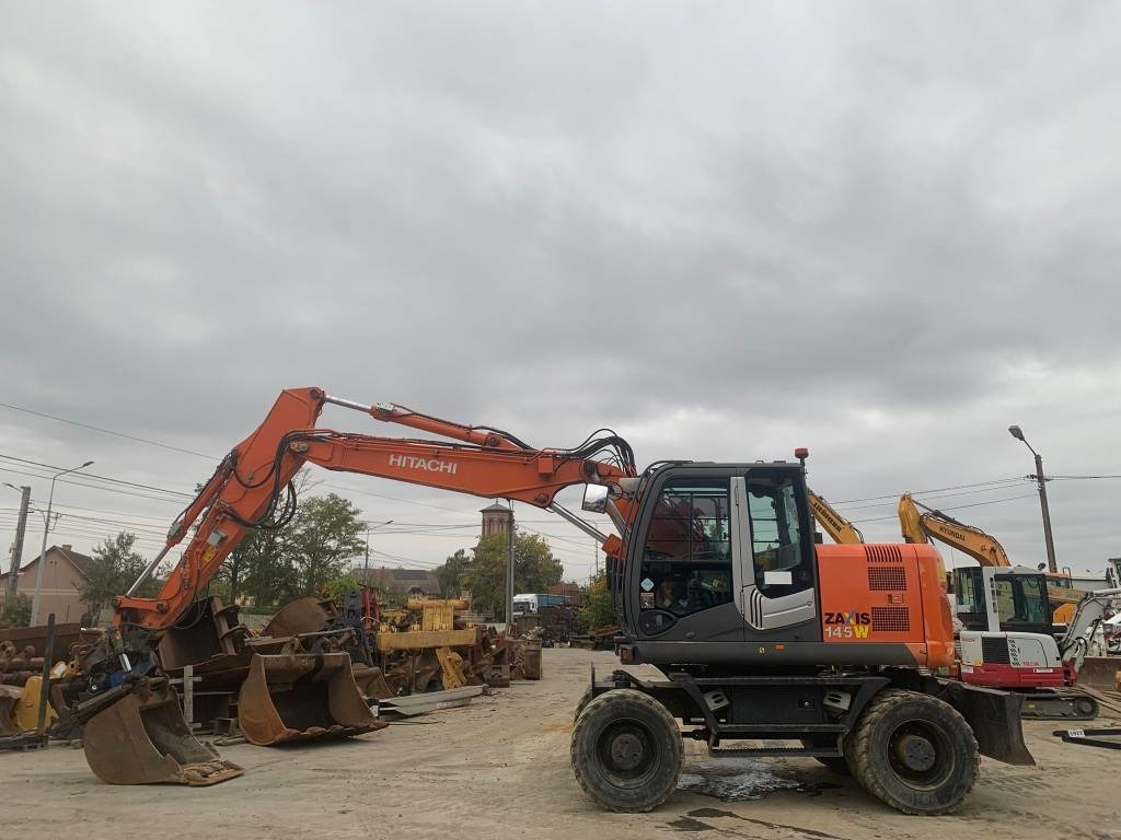 Hitachi ZX 145 W-3+SMP Rototilt - Колёсный экскаватор: фото 2 Hitachi ZX 145 W-3+SMP Rototilt - Колёсный экскаватор: фото 2