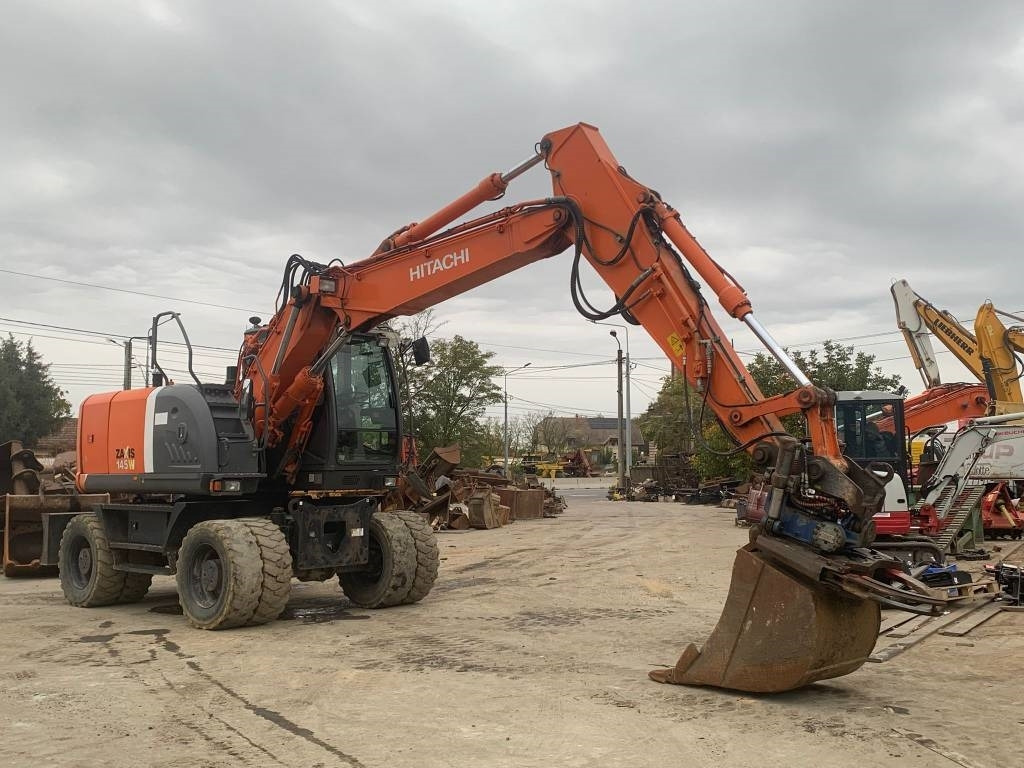 Hitachi ZX 145 W-3+SMP Rototilt - Колёсный экскаватор: фото 4 Hitachi ZX 145 W-3+SMP Rototilt - Колёсный экскаватор: фото 4