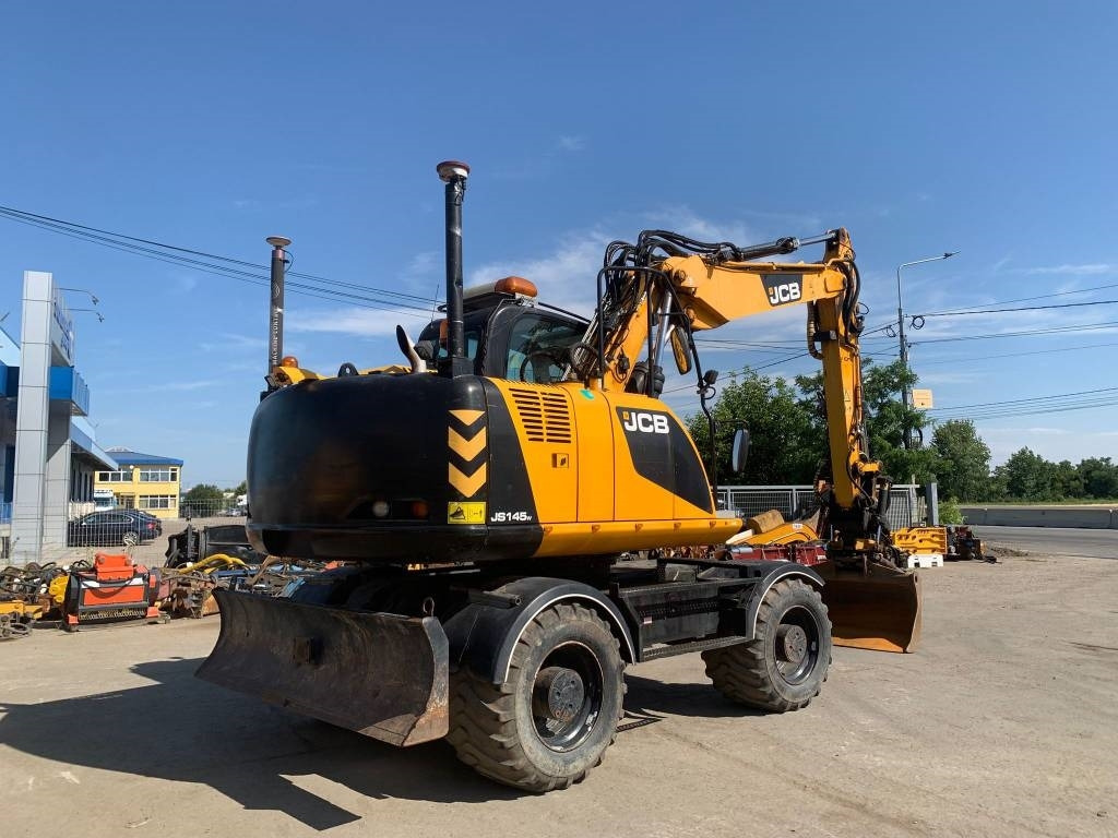 JCB JS 145 W+Engcon Rototilt+Sistem Laser 2D Leica Ico - Колёсный экскаватор: фото 4 JCB JS 145 W+Engcon Rototilt+Sistem Laser 2D Leica Ico - Колёсный экскаватор: фото 4