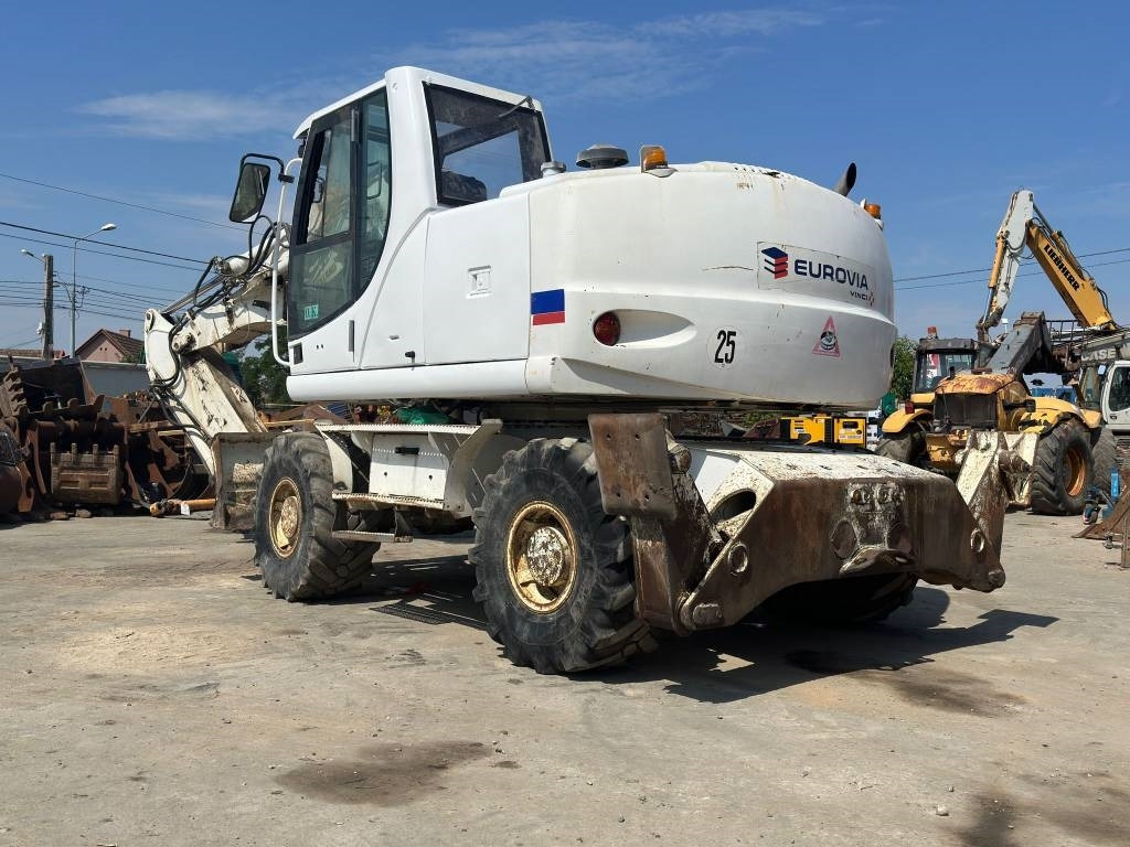 New Holland MH Plus - Колёсный экскаватор: фото 5 New Holland MH Plus - Колёсный экскаватор: фото 5