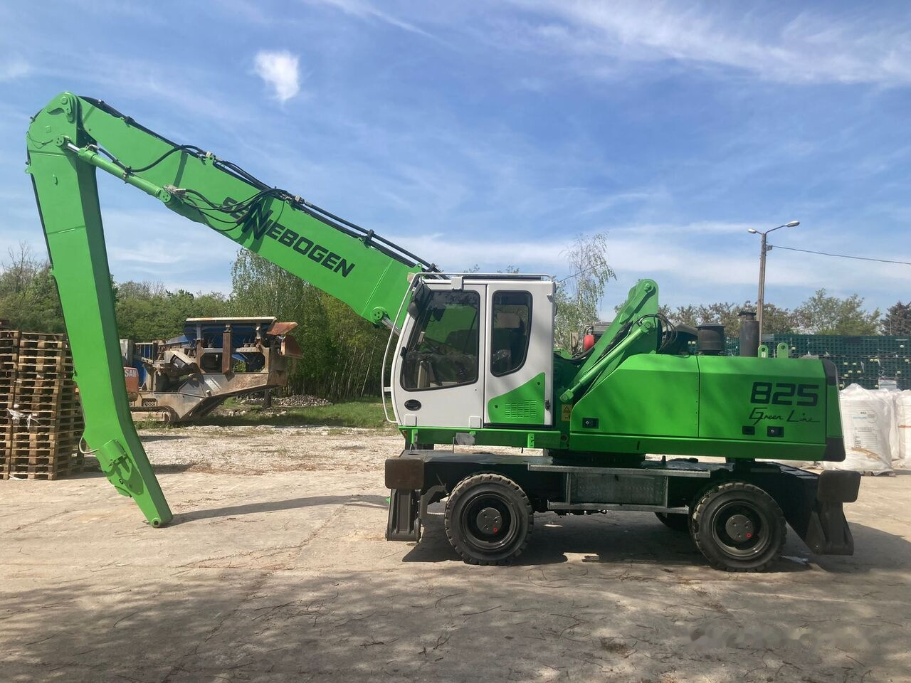 Sennebogen 825 - Перегружатель: фото 1 Sennebogen 825 - Перегружатель: фото 1