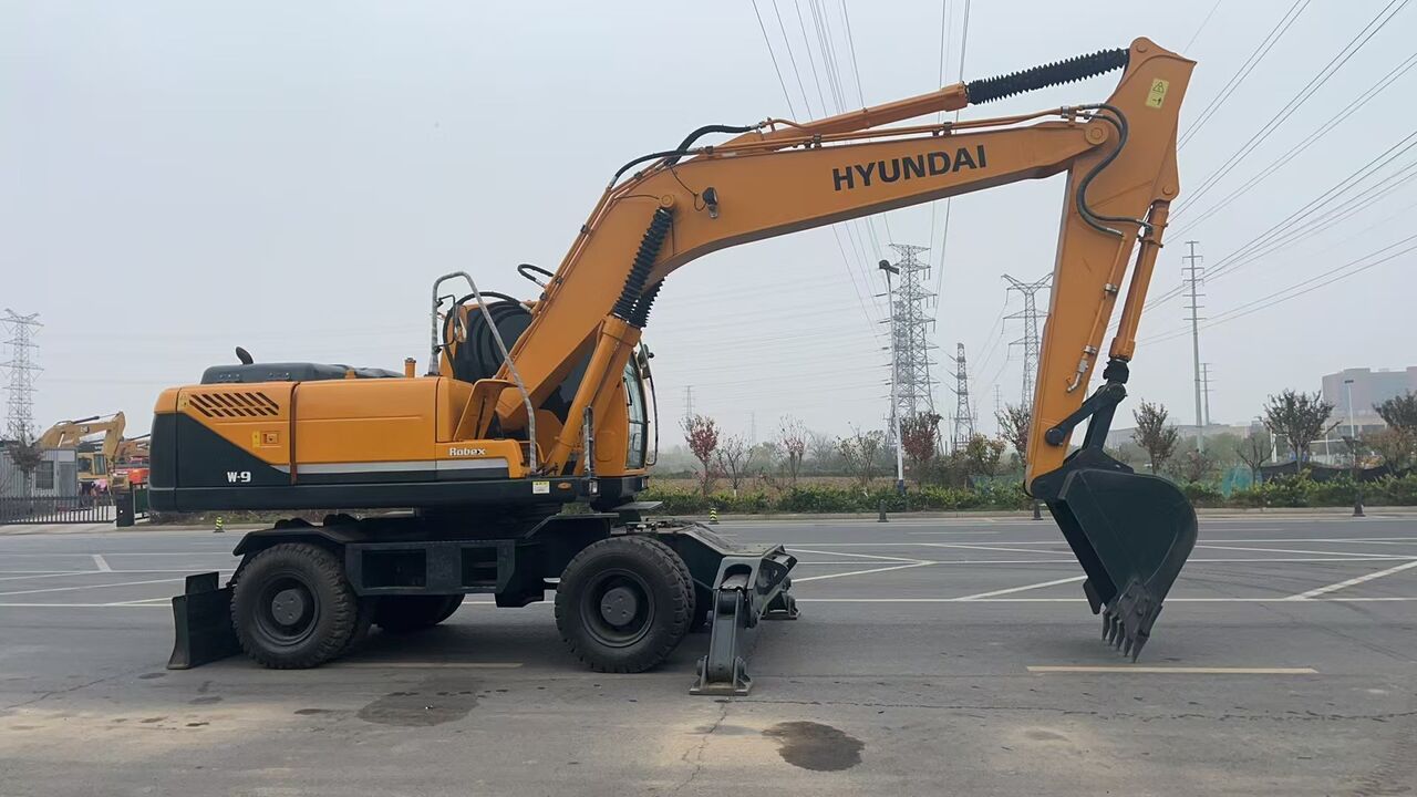 HYUNDAI 210W-9 - Колёсный экскаватор: фото 4 HYUNDAI 210W-9 - Колёсный экскаватор: фото 4