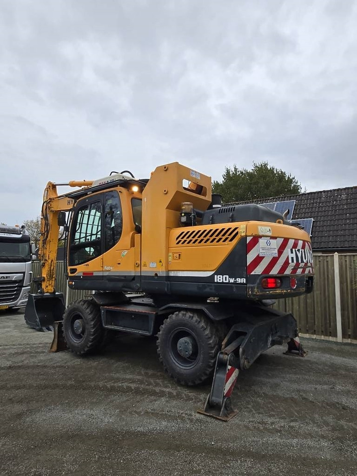 Hyundai R 180W-9A  - Колёсный экскаватор: фото 2 Hyundai R 180W-9A  - Колёсный экскаватор: фото 2