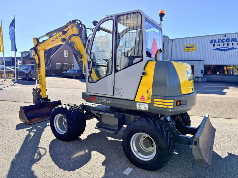 Neuson Wacker Neuson 6502/2 - Колёсный экскаватор: фото 2 Neuson Wacker Neuson 6502/2 - Колёсный экскаватор: фото 2