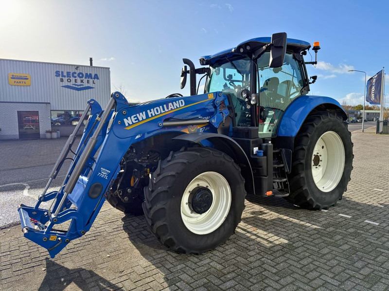 New Holland T7.210 AC Stage V + TL770 Voorlader - Трактор: фото 1 New Holland T7.210 AC Stage V + TL770 Voorlader - Трактор: фото 1