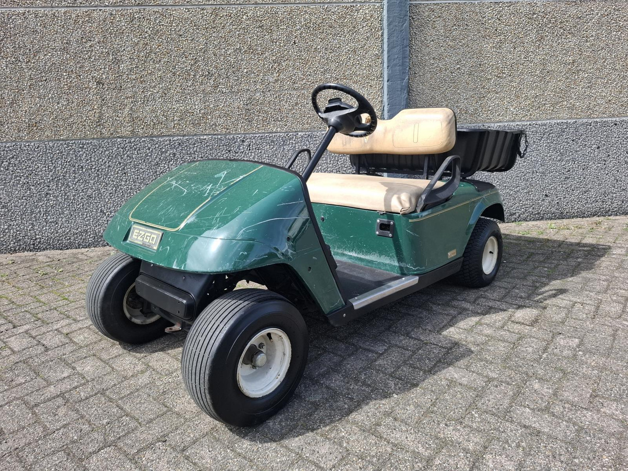 E-Z-GO TXT 2-Persoons Elektrische Golfkar met Open Laadbak 1442482 - Гольф-кар: фото 1 E-Z-GO TXT 2-Persoons Elektrische Golfkar met Open Laadbak 1442482 - Гольф-кар: фото 1