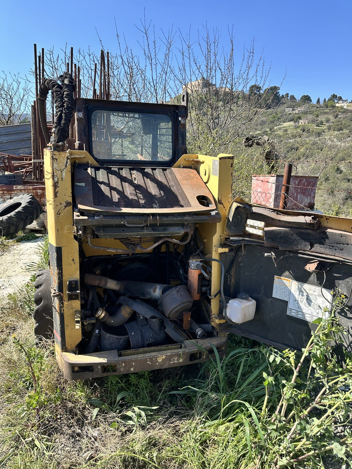 CAT 248 - Мини-погрузчик с бортовым поворотом: фото 3 CAT 248 - Мини-погрузчик с бортовым поворотом: фото 3