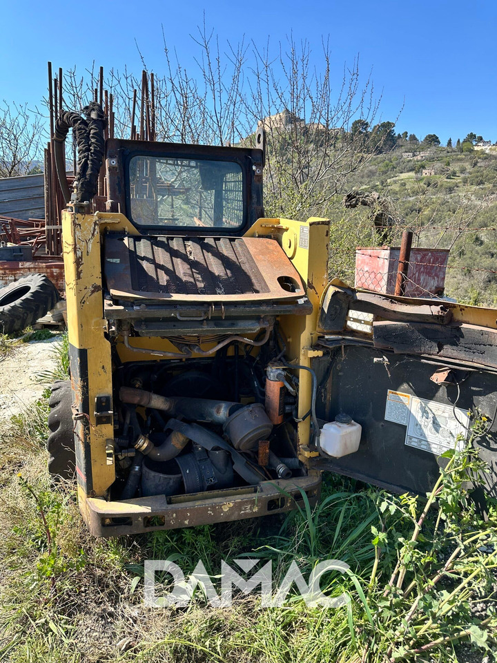 CAT 248 - Мини-погрузчик с бортовым поворотом: фото 3 CAT 248 - Мини-погрузчик с бортовым поворотом: фото 3