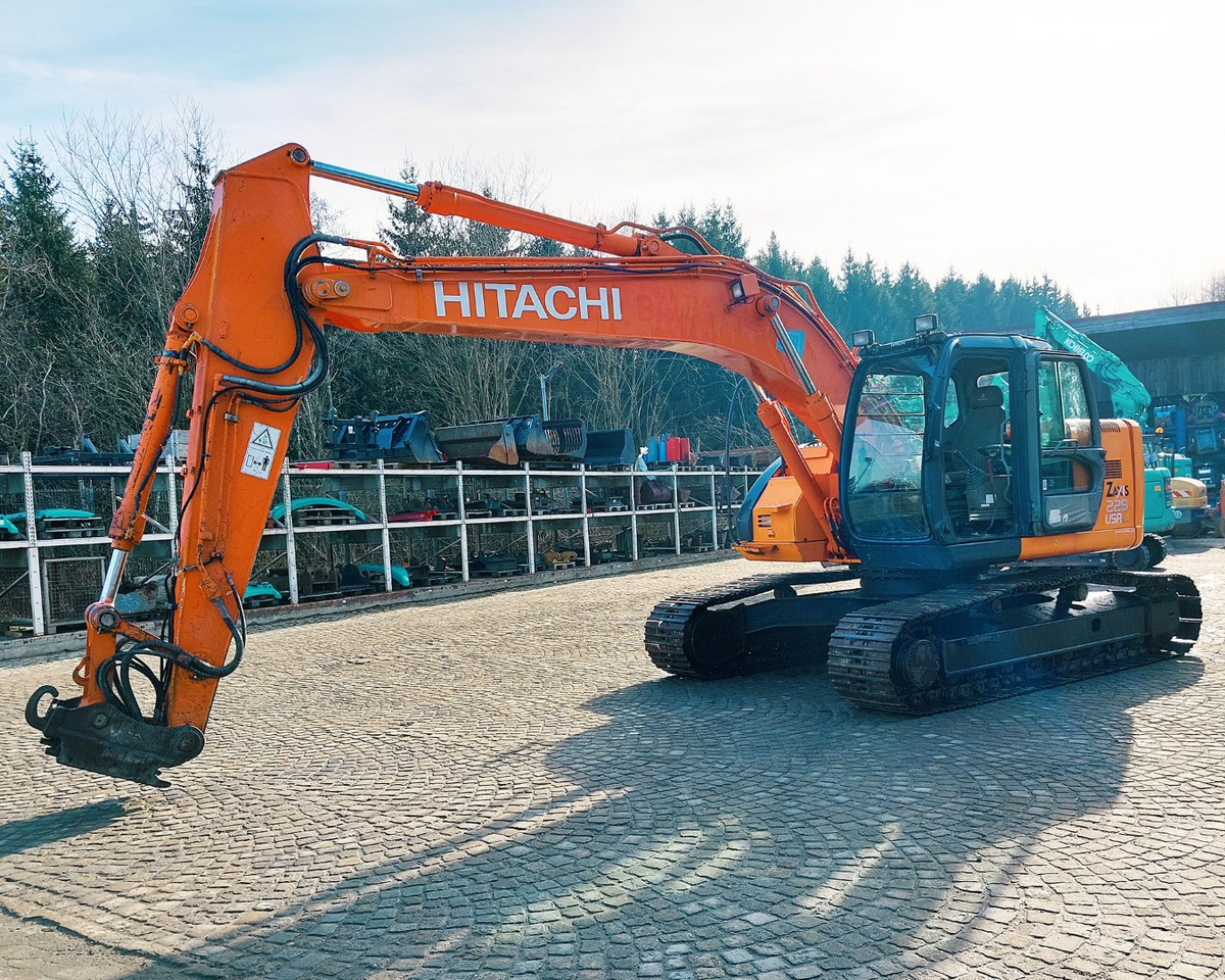 Hitachi ZX225USRLC - Гусеничный экскаватор: фото 1 Hitachi ZX225USRLC - Гусеничный экскаватор: фото 1