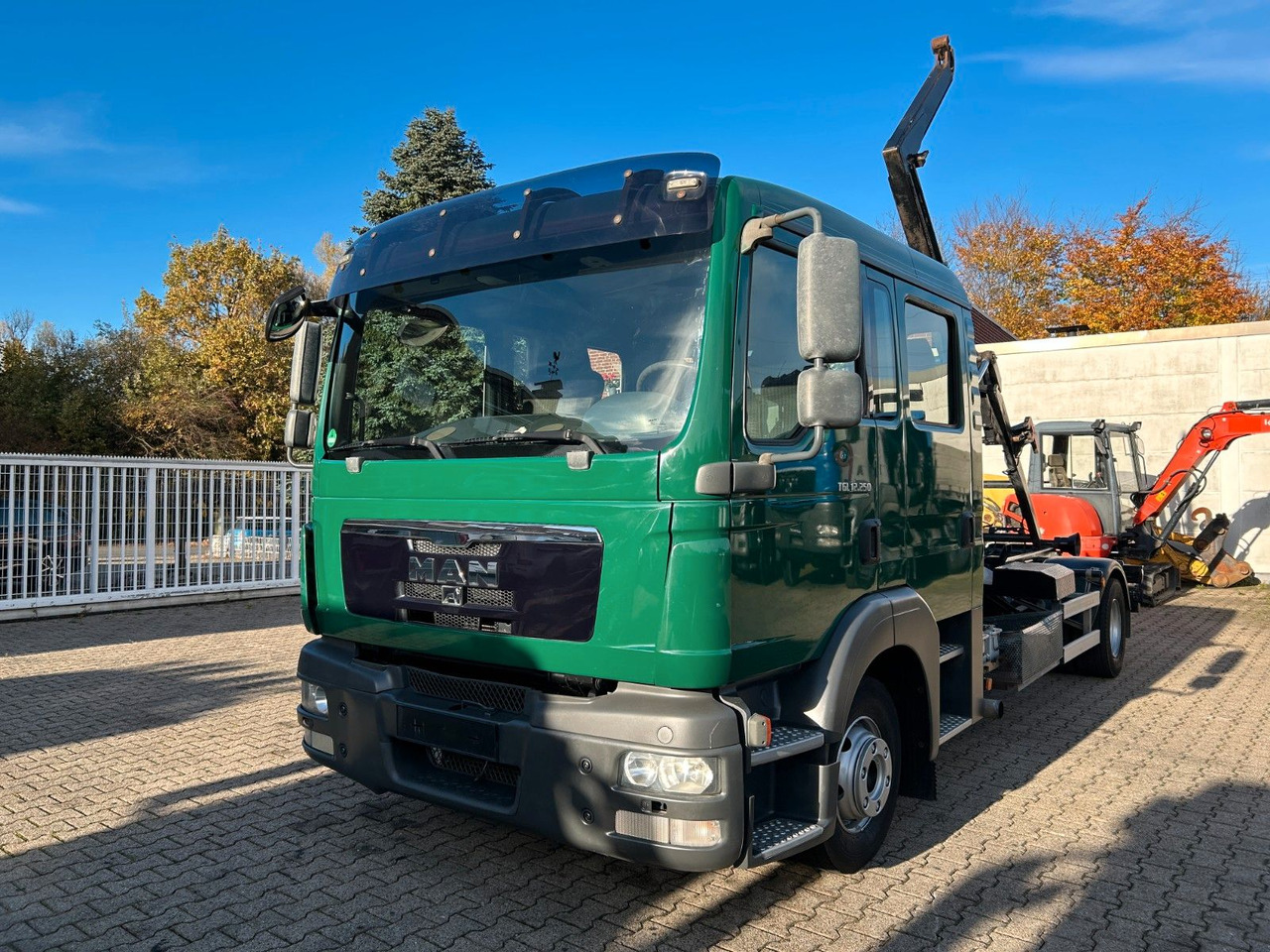 MAN 12.250 Doppelkabine Abroller - Крюковой мультилифт: фото 1 MAN 12.250 Doppelkabine Abroller - Крюковой мультилифт: фото 1