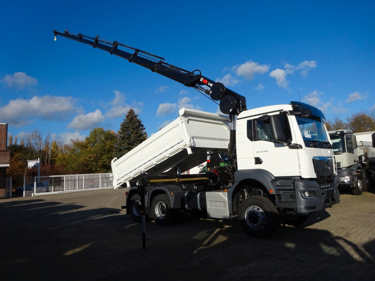 MAN 33.430 6x6 3-SEITENKIPPER KRAN HIAB 228- 6HYDRO - Самосвал, Автоманипулятор: фото 1 MAN 33.430 6x6 3-SEITENKIPPER KRAN HIAB 228- 6HYDRO - Самосвал, Автоманипулятор: фото 1