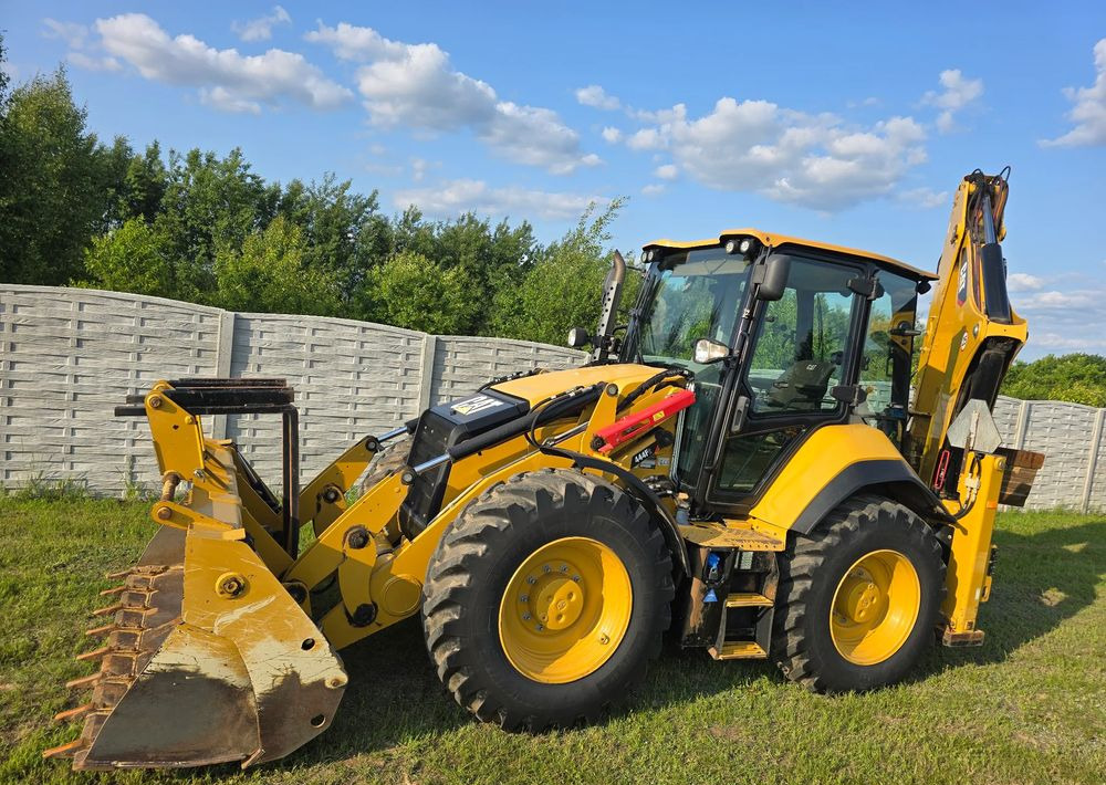 Caterpillar - Экскаватор-погрузчик: фото 3 Caterpillar - Экскаватор-погрузчик: фото 3