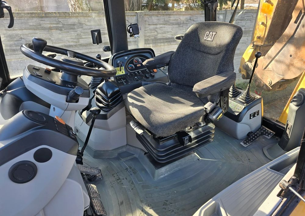 Caterpillar - Экскаватор-погрузчик: фото 3 Caterpillar - Экскаватор-погрузчик: фото 3