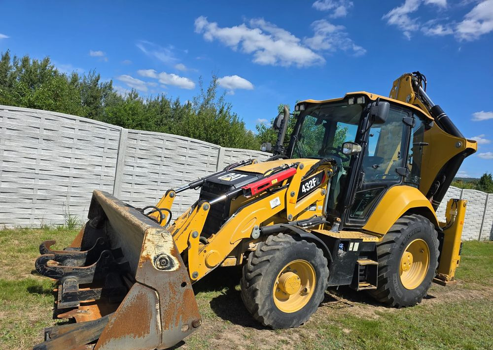 Caterpillar - Экскаватор-погрузчик: фото 1 Caterpillar - Экскаватор-погрузчик: фото 1