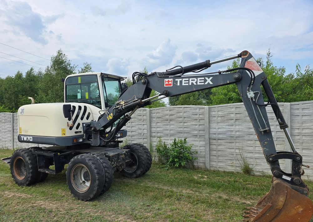 Terex - Колёсный экскаватор: фото 1 Terex - Колёсный экскаватор: фото 1