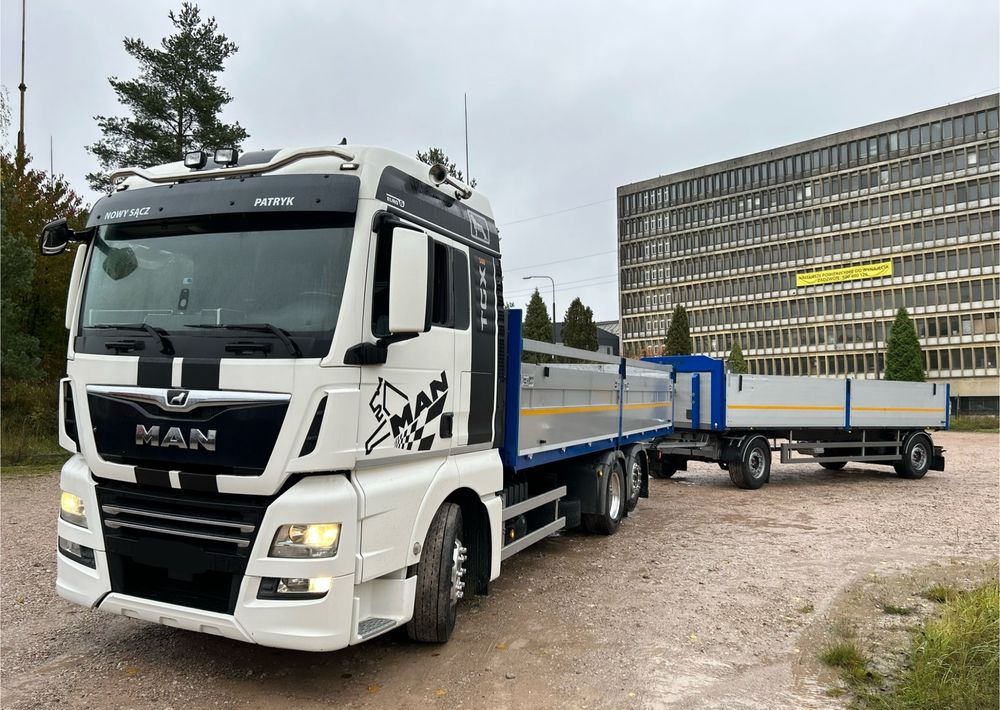 MAN TGX Tandem 1m burty TOP KOMPLET / ALUFELGI / zarejestrowany gotowy do pracy / przyczepa 18t / FULL OPCJA / 26.420 26.460 26.500 26.400 26.440 26.480 26.510 460 500 - Грузовик бортовой/ Платформа: фото 1 MAN TGX Tandem 1m burty TOP KOMPLET / ALUFELGI / zarejestrowany gotowy do pracy / przyczepa 18t / FULL OPCJA / 26.420 26.460 26.500 26.400 26.440 26.480 26.510 460 500 - Грузовик бортовой/ Платформа: фото 1