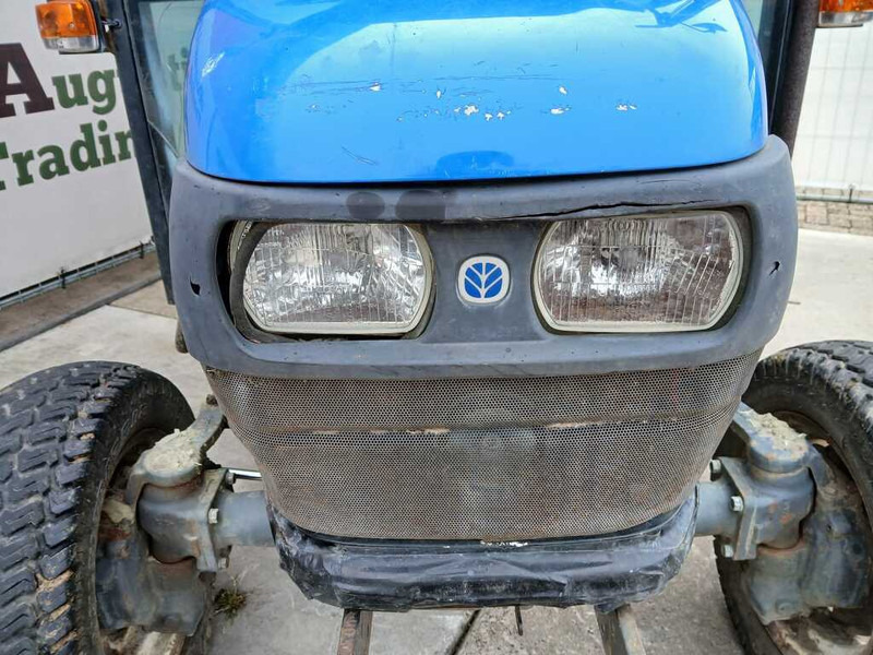 New Holland TC 27 - Трактор: фото 5 New Holland TC 27 - Трактор: фото 5