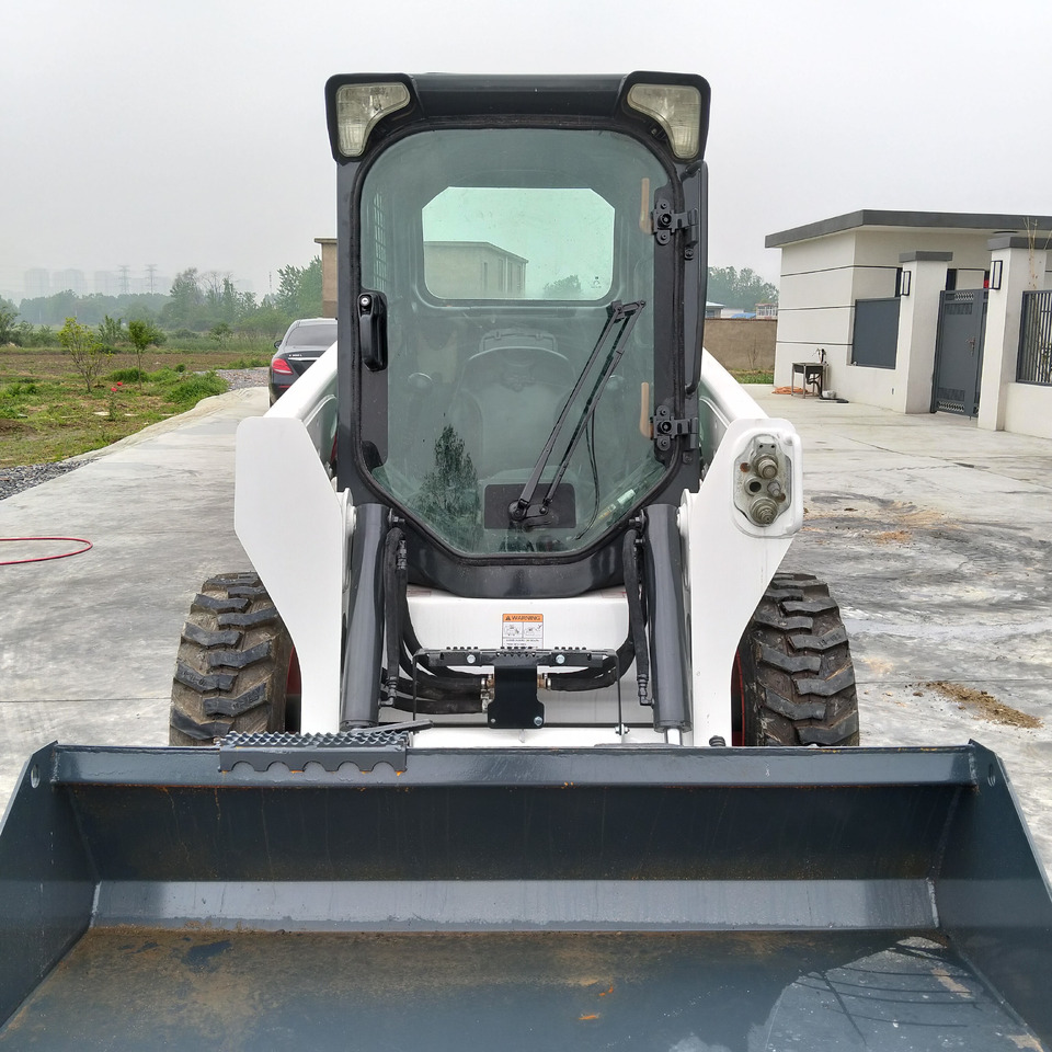 BOBCAT S550 - Мини-погрузчик с бортовым поворотом: фото 4 BOBCAT S550 - Мини-погрузчик с бортовым поворотом: фото 4