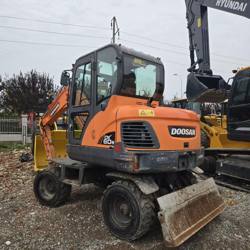DOOSAN DX60W - Колёсный экскаватор: фото 5 DOOSAN DX60W - Колёсный экскаватор: фото 5