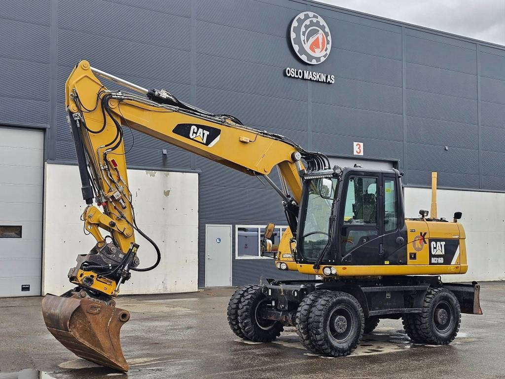 CAT M 316 D - Колёсный экскаватор: фото 1 CAT M 316 D - Колёсный экскаватор: фото 1