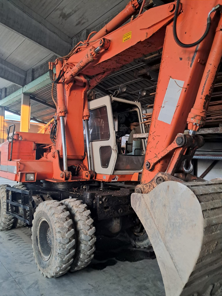 FH FH 150 A - Колёсный экскаватор: фото 1 FH FH 150 A - Колёсный экскаватор: фото 1